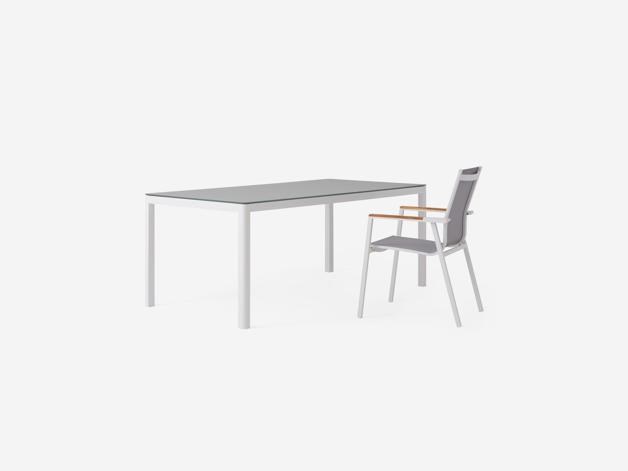 The Cape outdoor dining table with a Cape patio dining chair